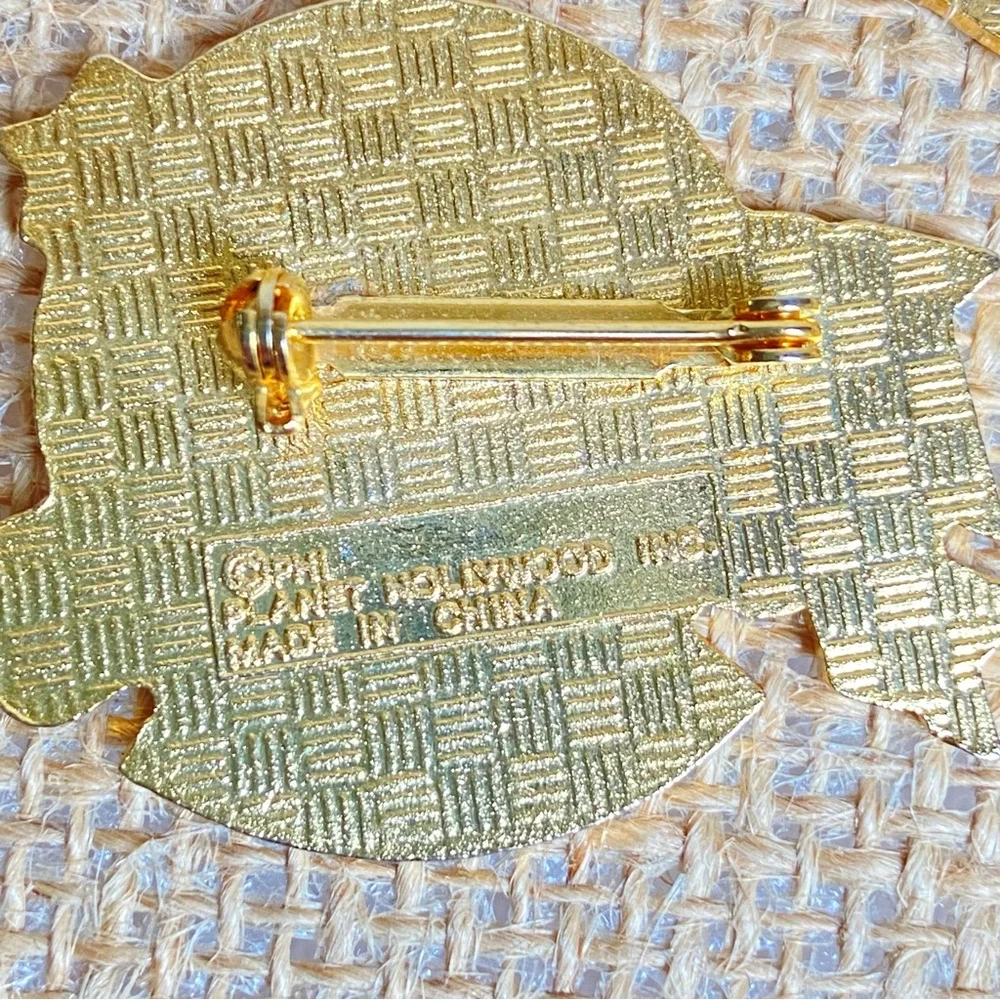 Planet Hollywood Cancun Paris London three pins in enamel over goldtone metal